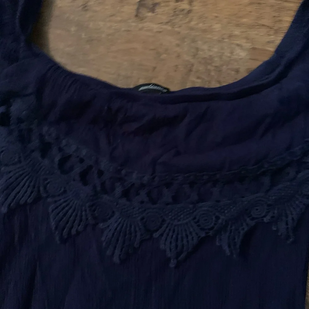 Ruffled romper L